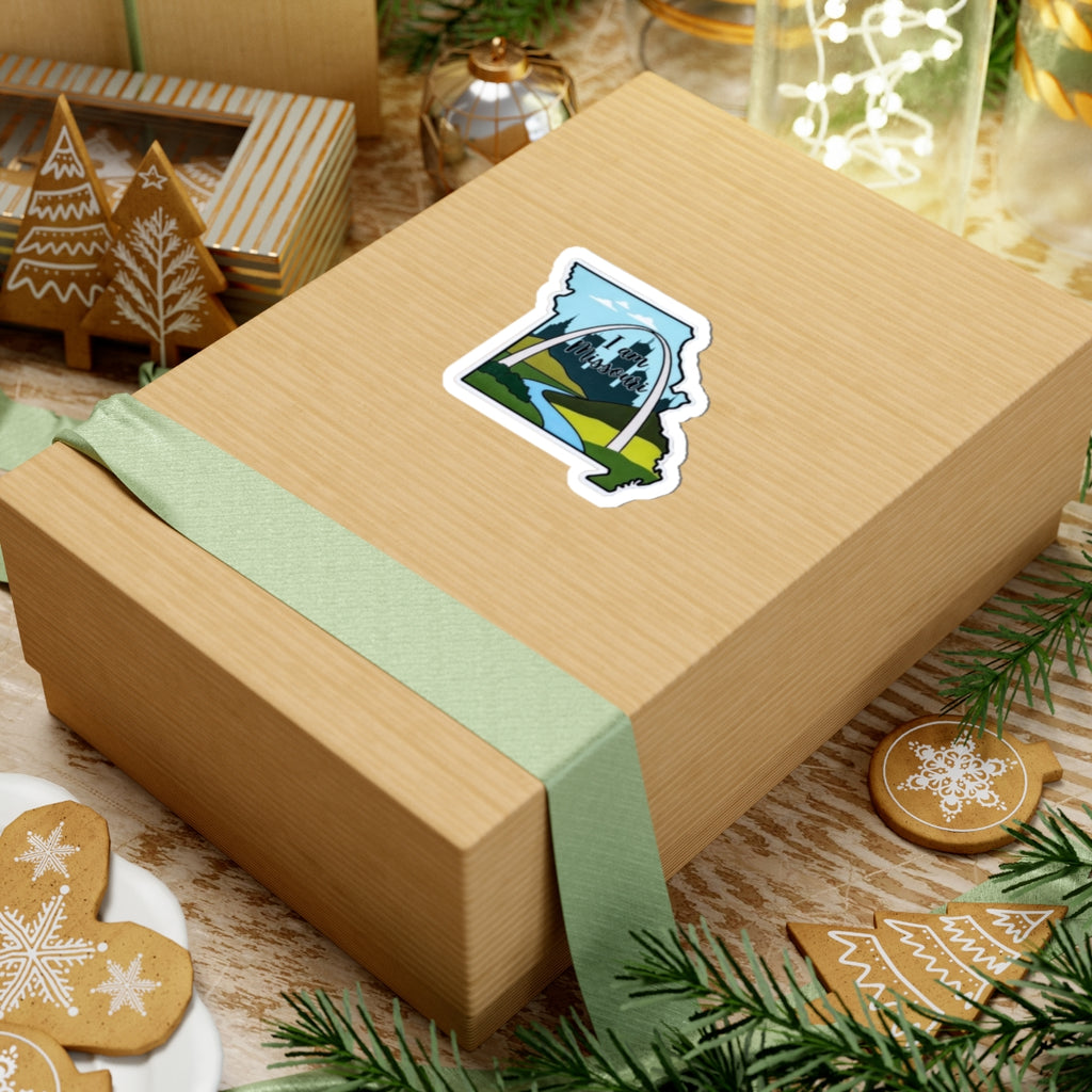 I Am Missouri sticker on a gift box with green ribbon and decorations