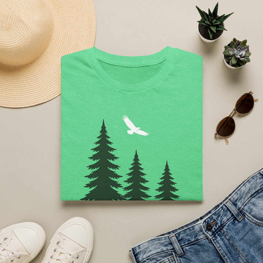 Bright green t-shirt with pine tree scene and a white soaring bird graphic