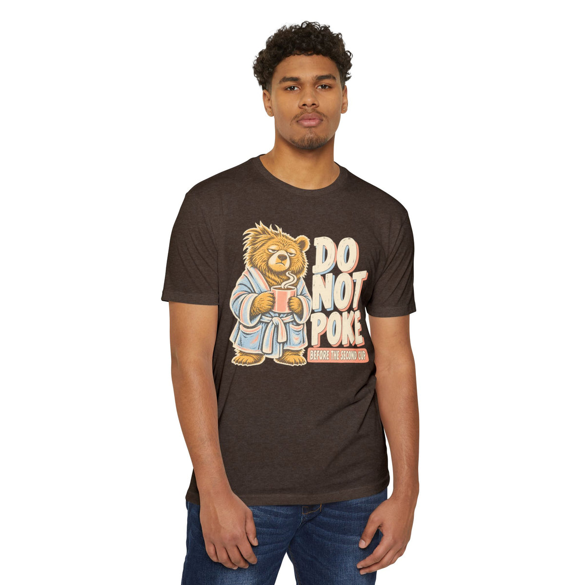 Brown t-shirt with grumpy bear holding a cup and “DO NOT POKE” graphic on front.