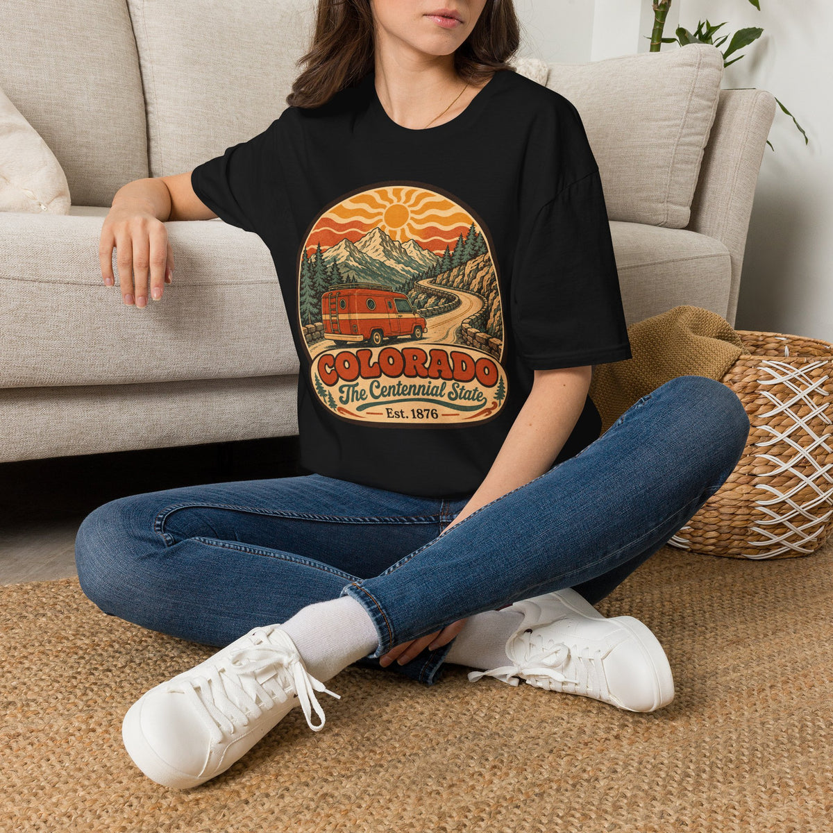 Black unisex T-shirt with Colorado vintage road and mountain sunset graphic on front