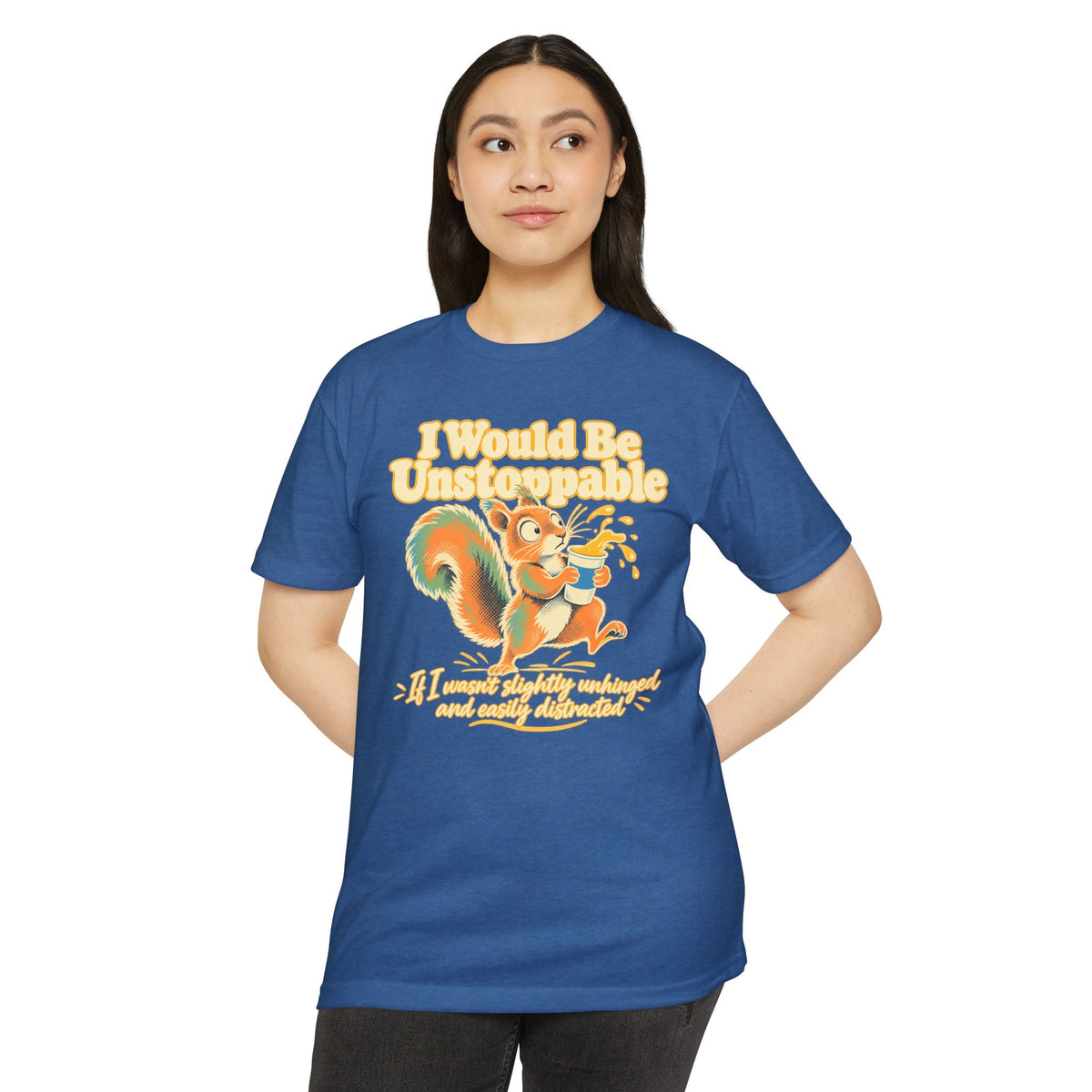 Light blue crewneck T-shirt with colorful squirrel graphic and humorous text on front.