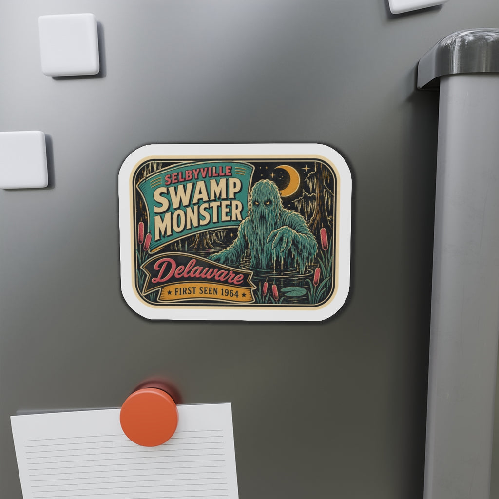 Die-cut magnet featuring Swamp Monster in teal and gold with 'Delaware' text