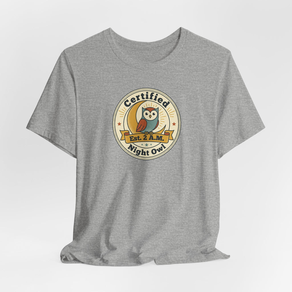 Dark grey T-shirt with Certified Night Owl badge graphic on chest