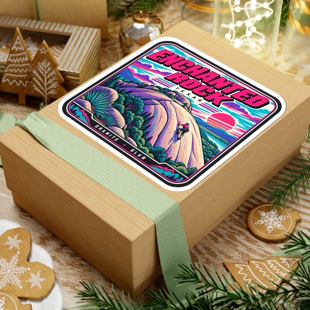 Square kiss-cut sticker on a wrapped gift, bold title and rock climber landscape art