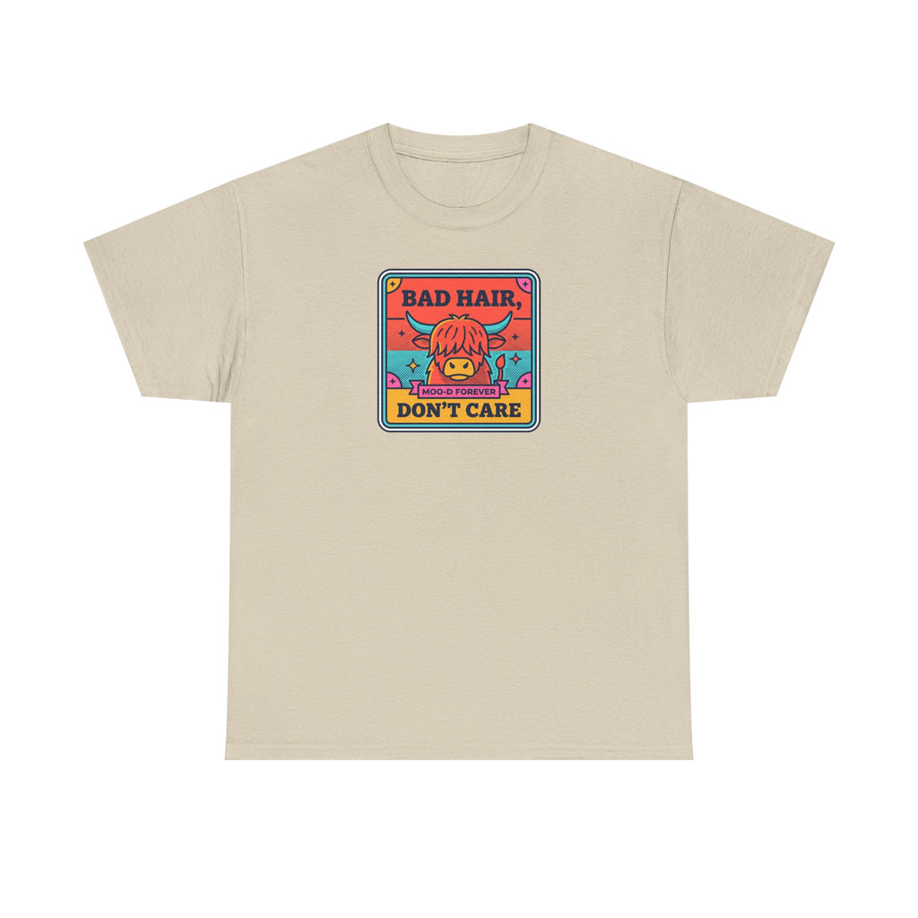 Beige t-shirt with square cow graphic reading “Bad Hair Don’t Care”.