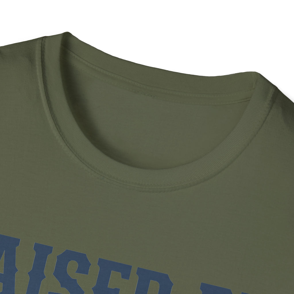 Military green crewneck T-shirt close-up with partial 'VETERAN' graphic.