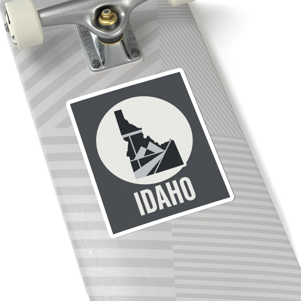 Idaho geometric map kiss-cut sticker, dark square with white circle, Idaho silhouette and IDAHO text