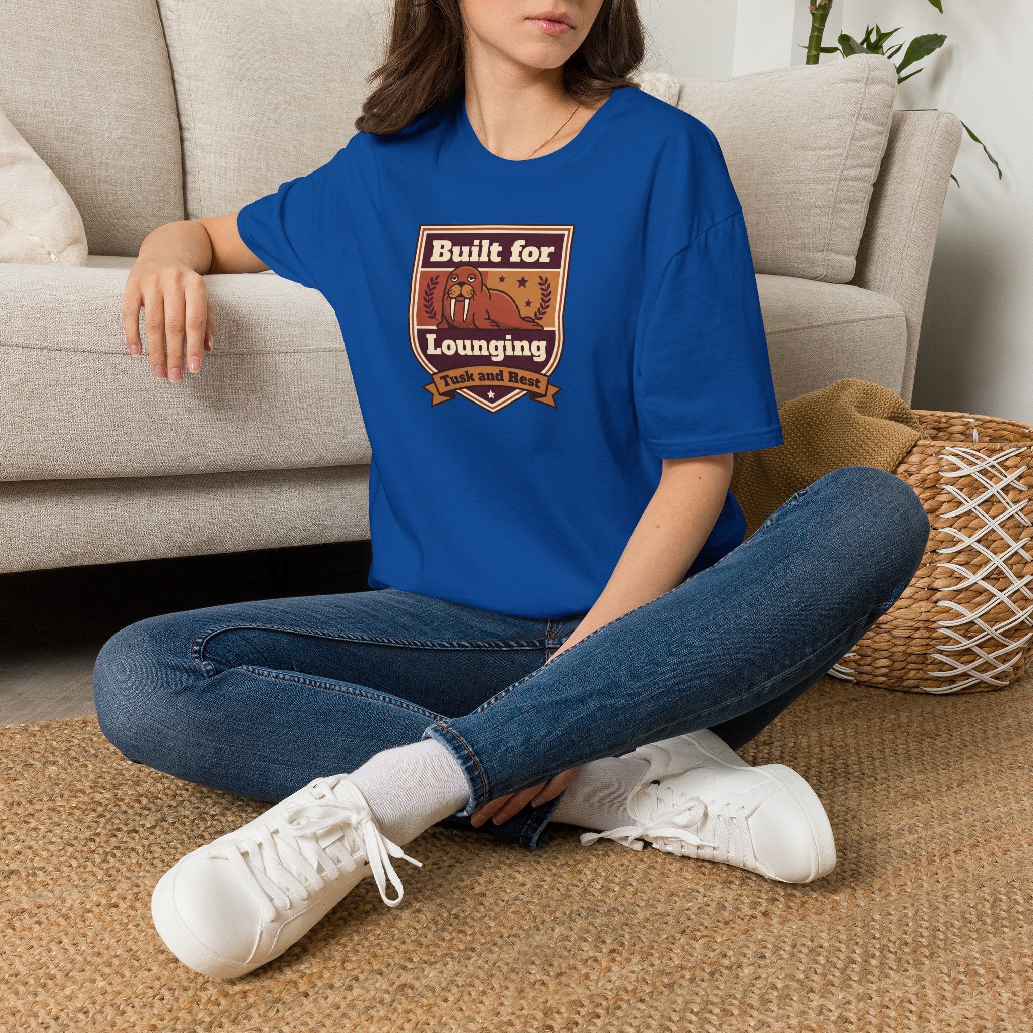 Royal blue short-sleeve T-shirt with walrus logo graphic on chest
