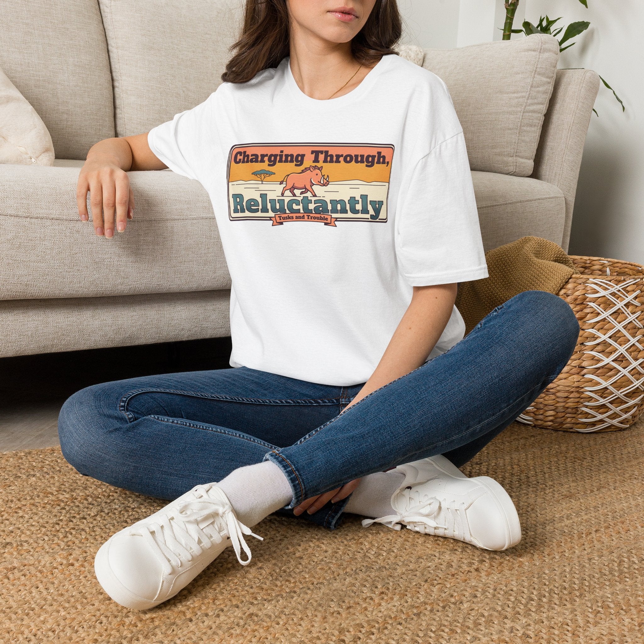 White graphic T-shirt with cartoon rhino and retro banner-style text print