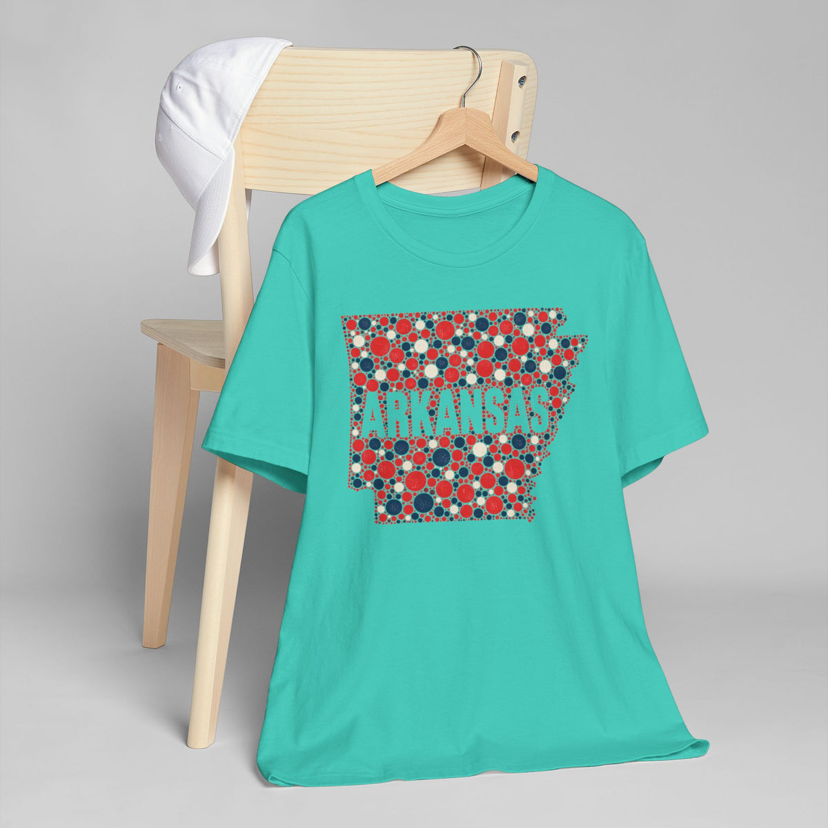 Teal crewneck t-shirt with red, blue, white Arkansas graphic on chest