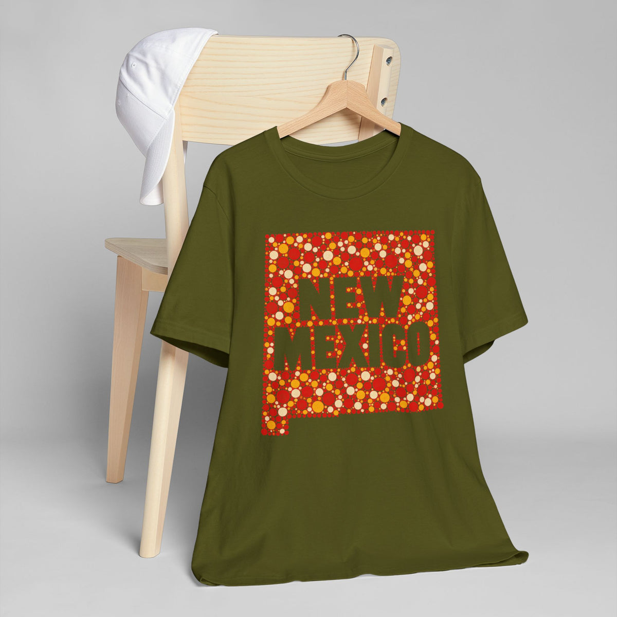 Olive green short-sleeve T-shirt with colorful “NEW MEXICO” graphic on front
