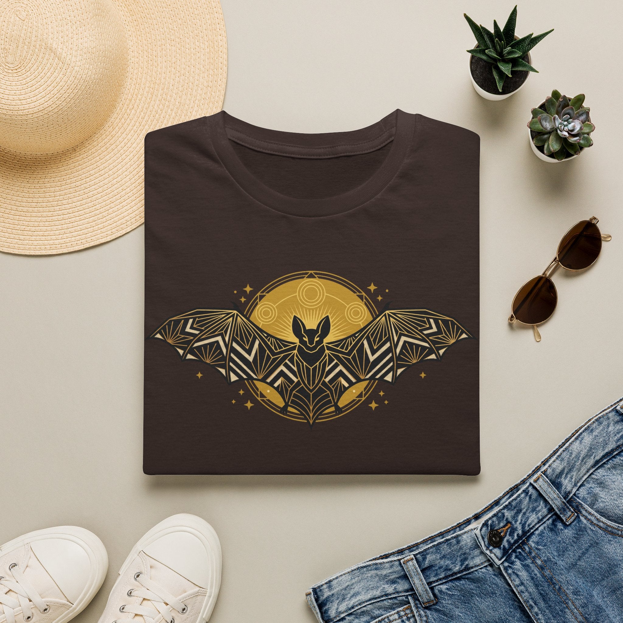 Dark T-shirt with geometric bat and moon graphic at center front