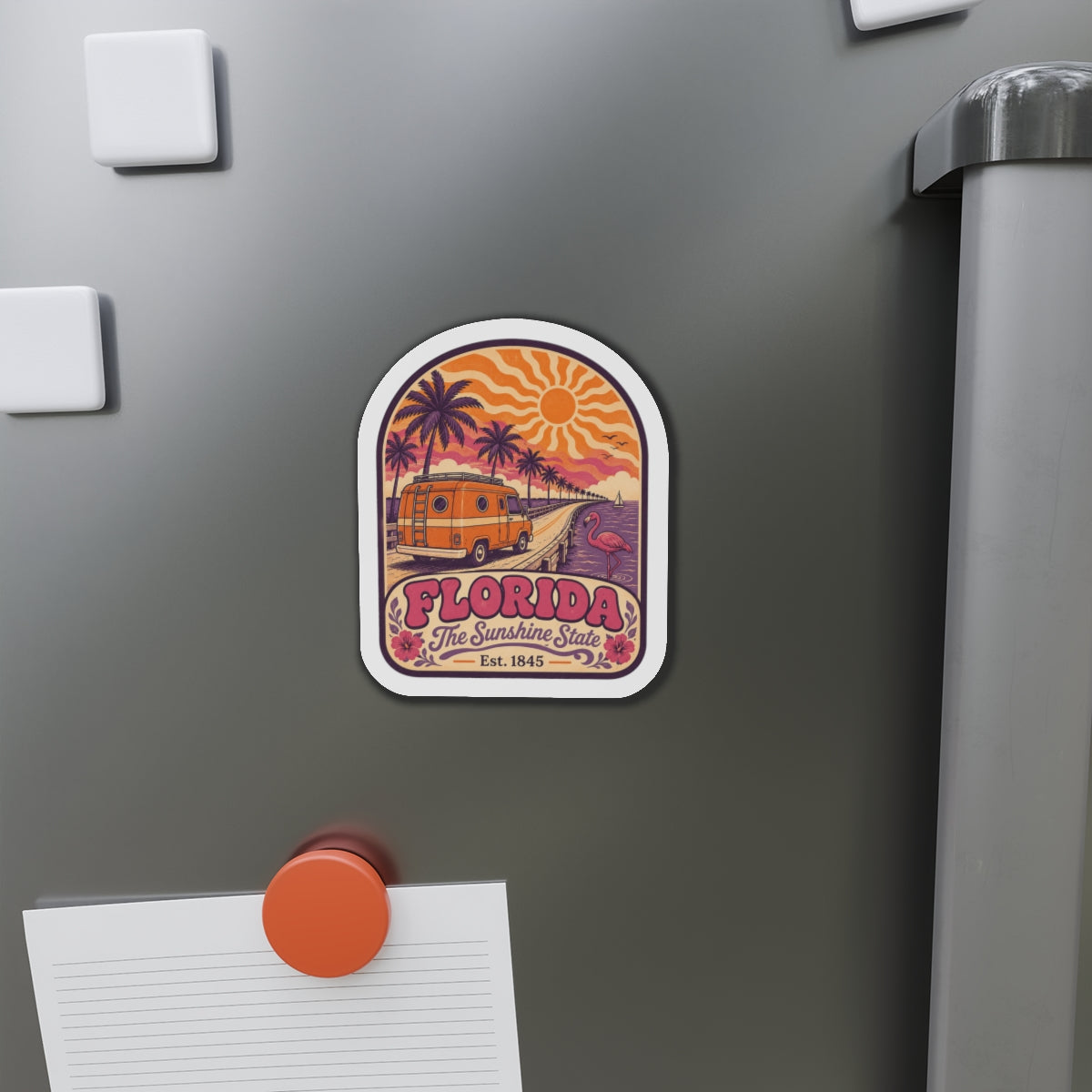 Florida die-cut magnet displayed on a stainless refrigerator