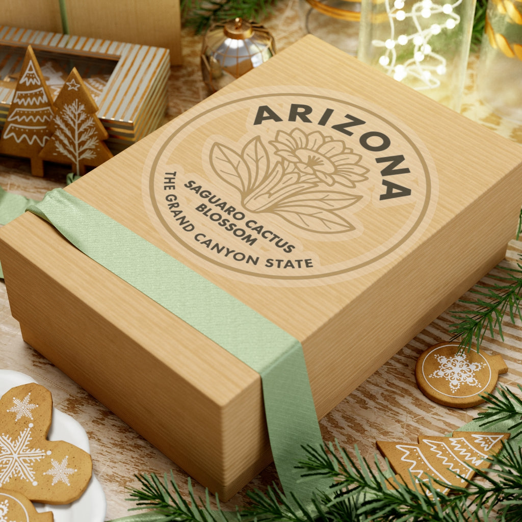 Circular transparent vinyl Arizona sticker on gift box lid, Saguaro Cactus Blossom text