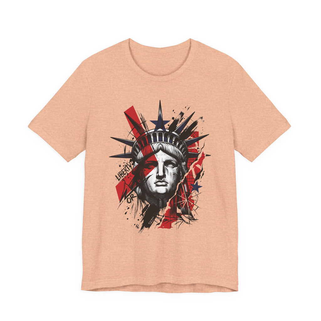 Heather peach graphic t-shirt with Statue of Liberty face illustration in red and black