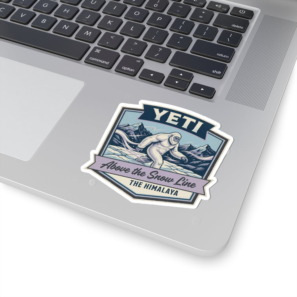 YETI die-cut sticker on laptop with Himalayan sasquatch above the snow line