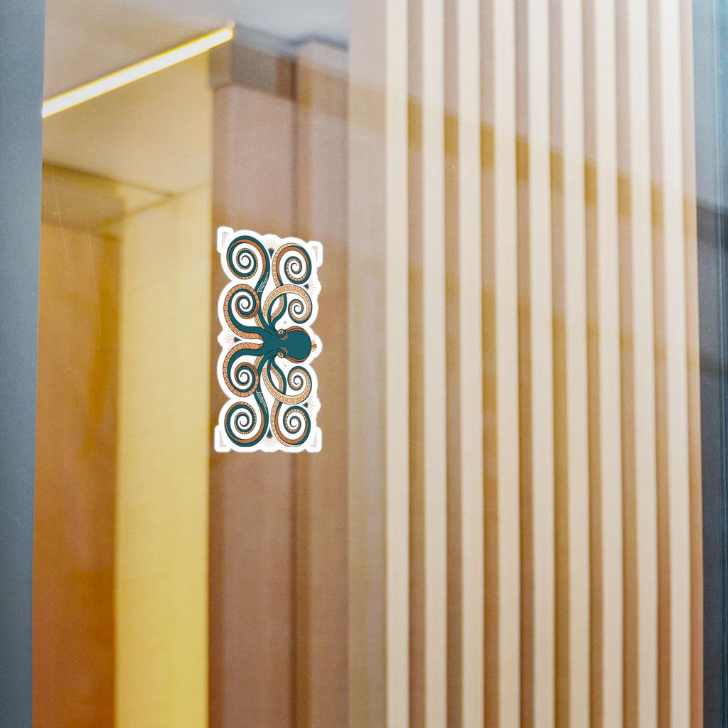 Ornate octopus decal on door or panel: teal body with orange spiral tentacles