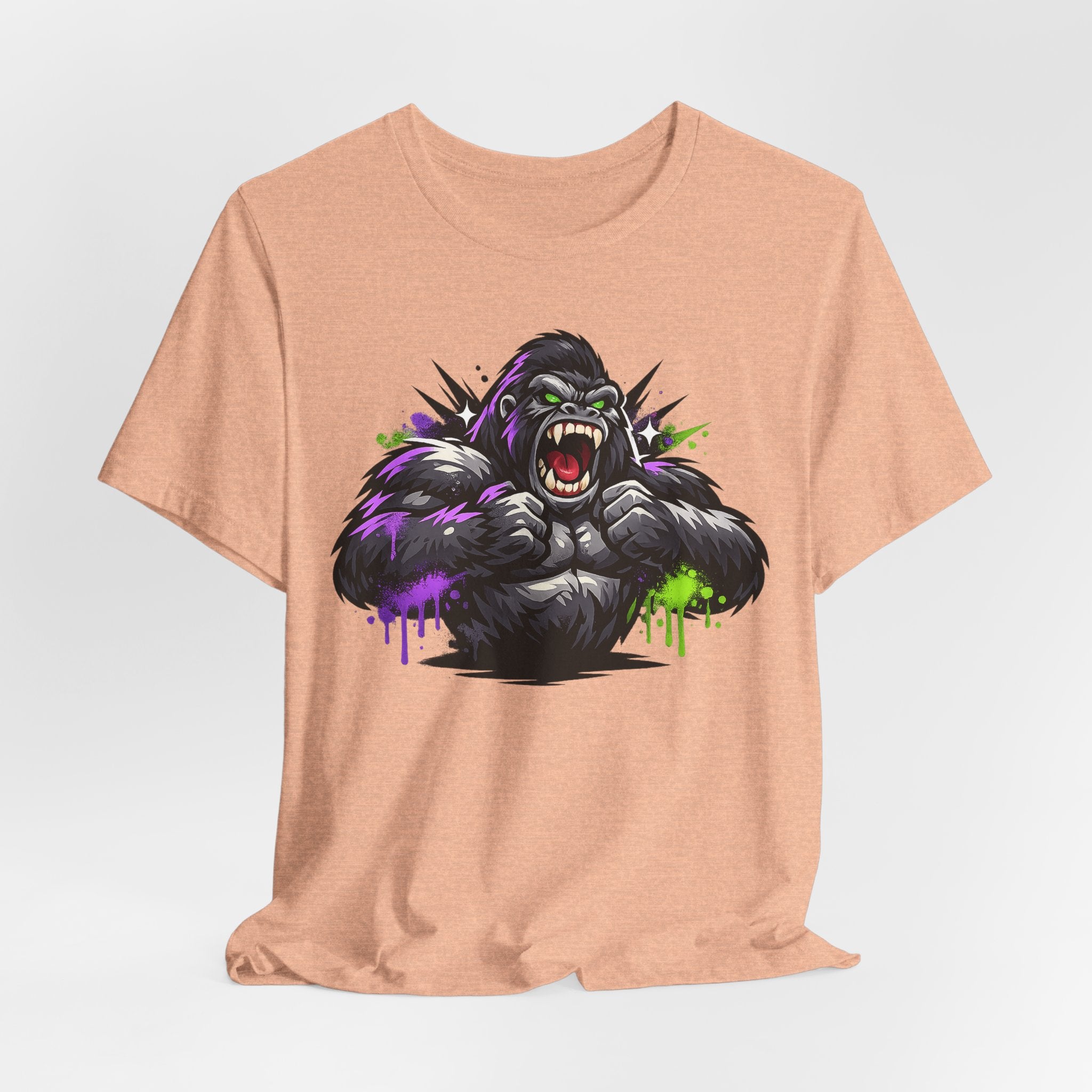 Peach unisex crew-neck tee featuring a roaring gorilla face graphic in purple and green.