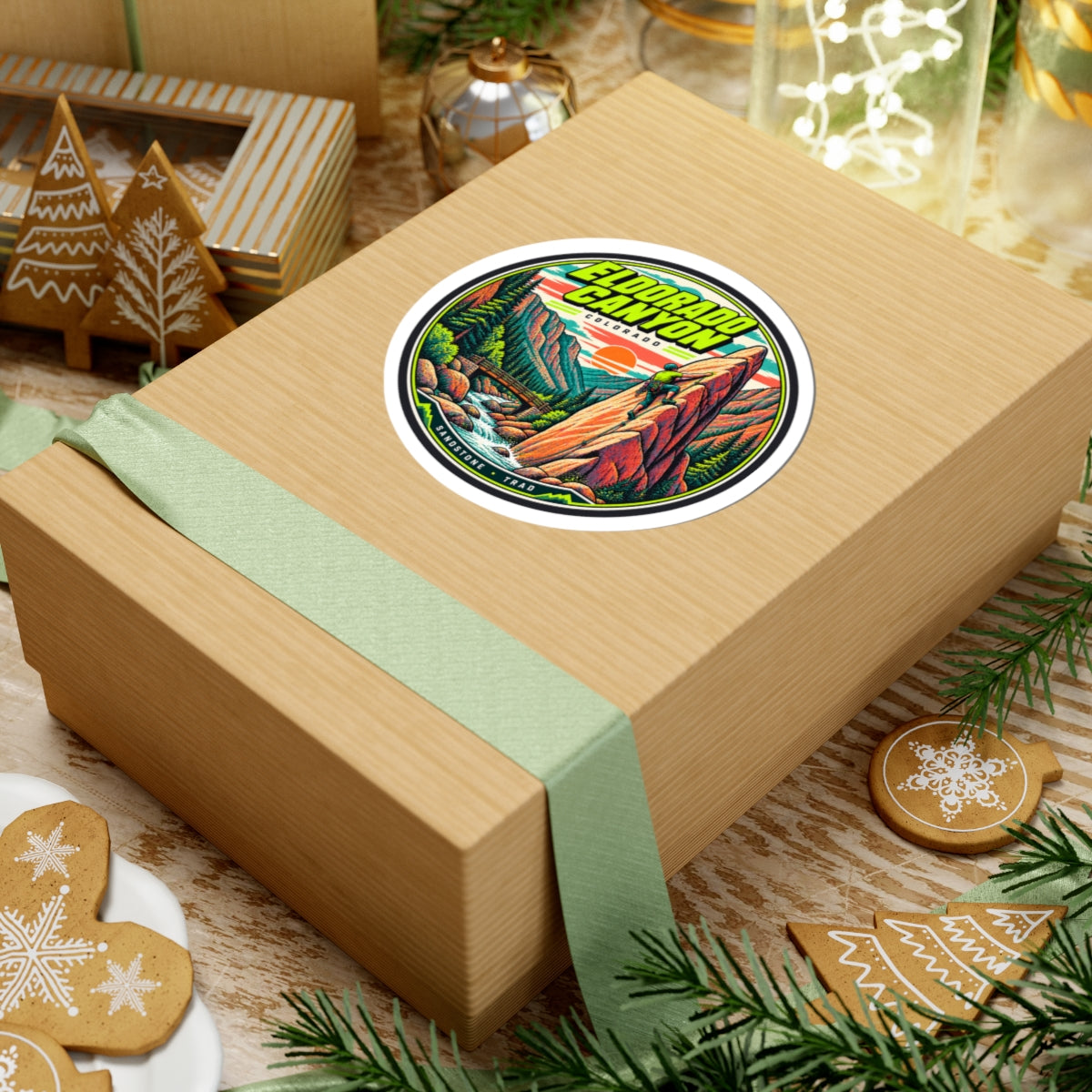 Round vinyl climbing sticker with 'Eldorado Canyon' title, climber on rock, and pine forest.