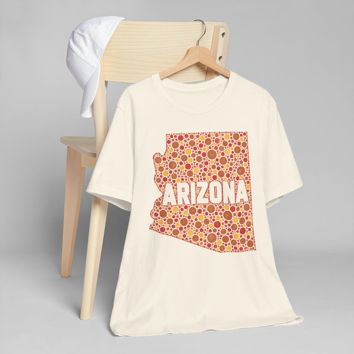 Cream crew-neck T-shirt with orange Arizona graphic pattern front