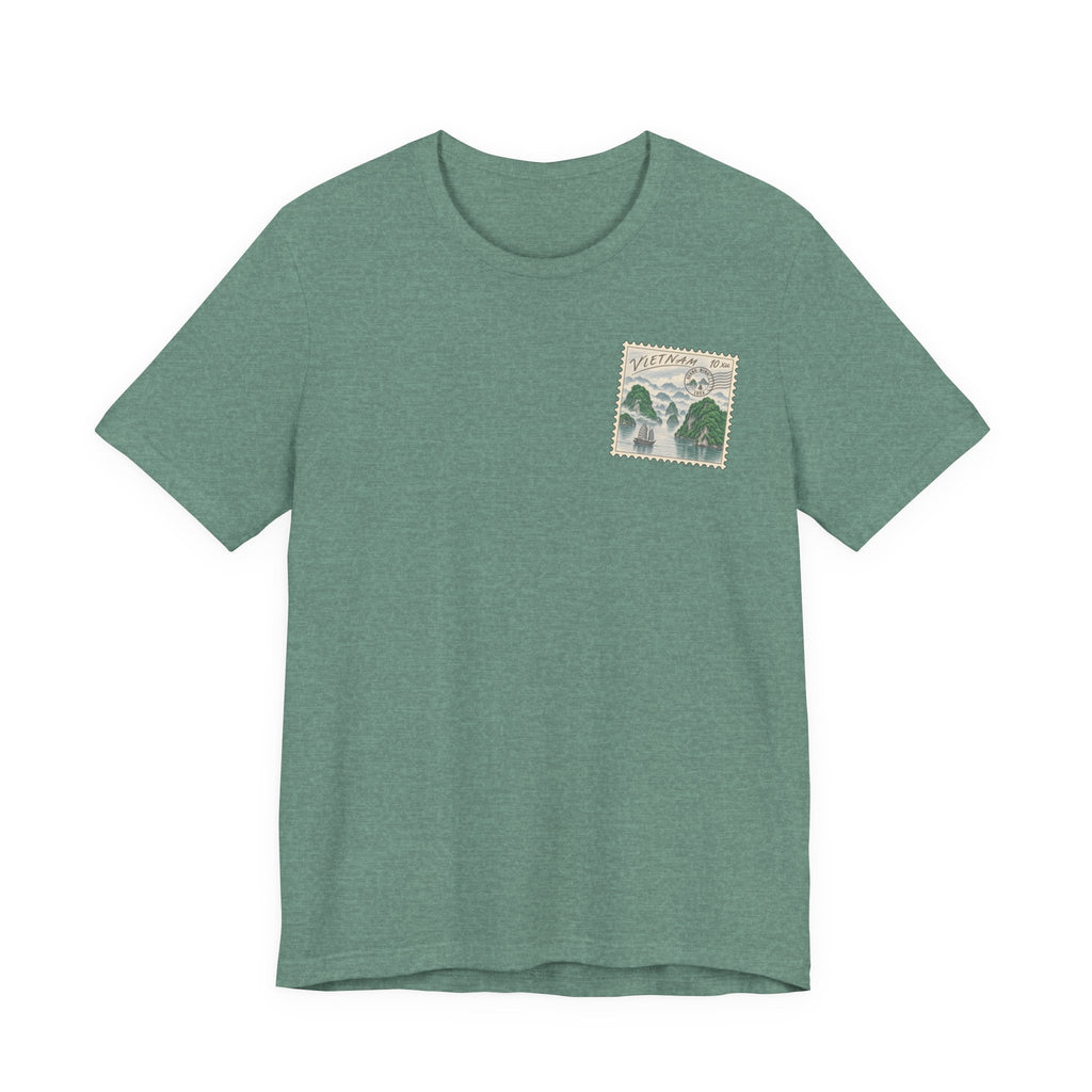 Green short-sleeve T-shirt with small postage-stamp style graphic on the chest