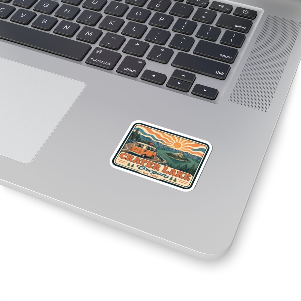 Vintage Crater Lake National Park sticker with scenic lake and sun, kiss-cut border