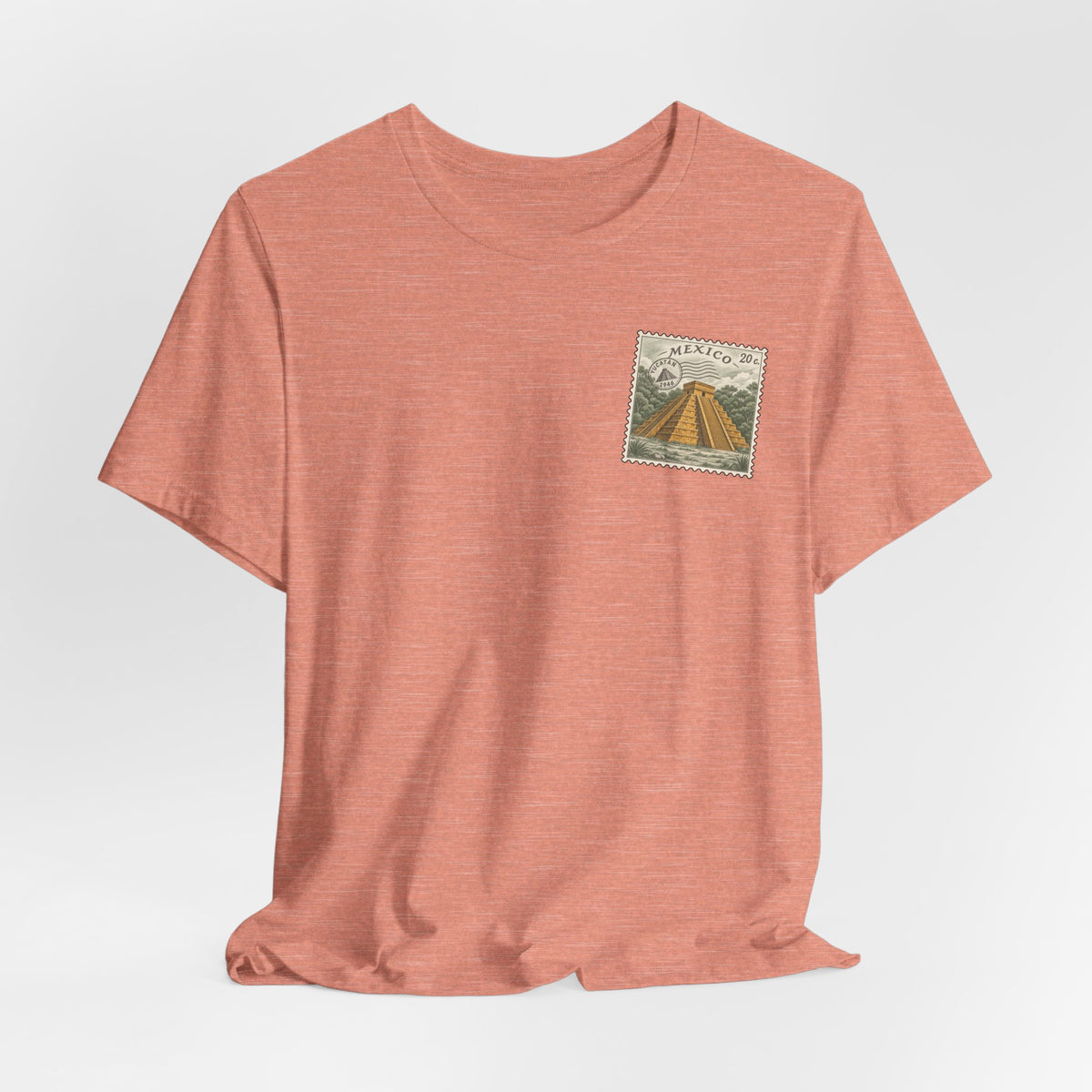 Rust orange crew-neck T-shirt with Mexico postage stamp graphic on chest