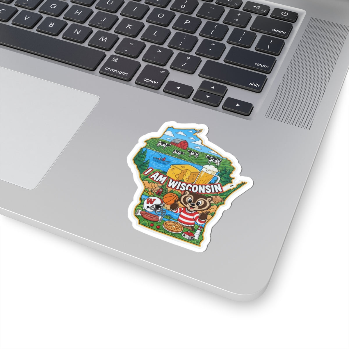 I Am Wisconsin sticker on a laptop keyboard, colorful state illustration and mascot