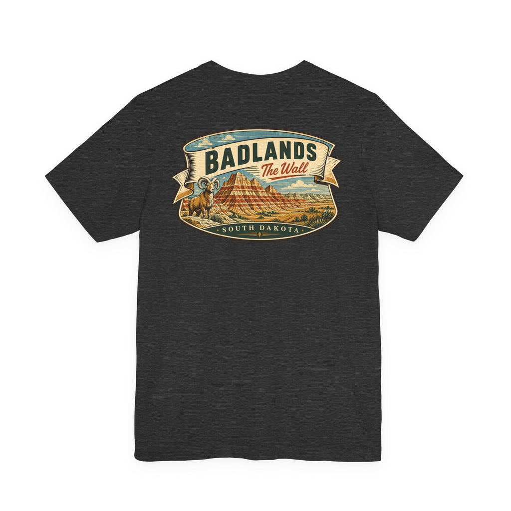 Dark charcoal T-shirt with “BADLANDS” landscape graphic badge across the chest