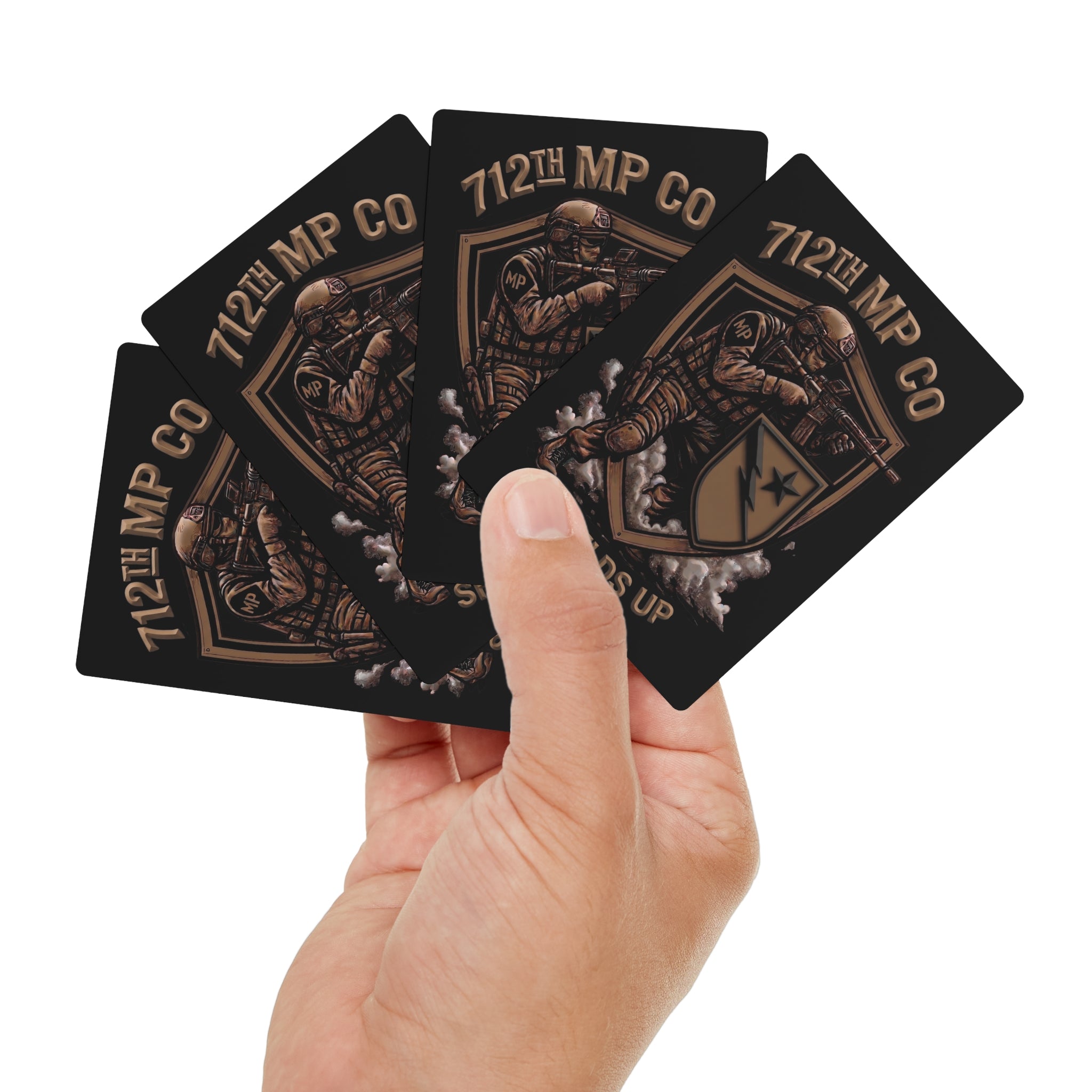 Poker cards held in hand, fanned faces with Shields Up artwork