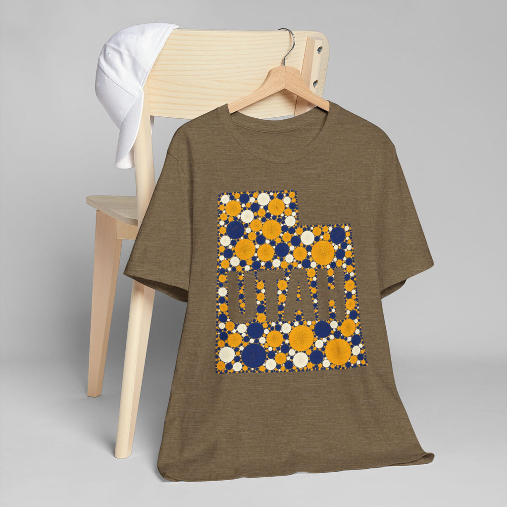 Brown T-shirt with blue and gold polka-dot Utah map outline and lettering graphic