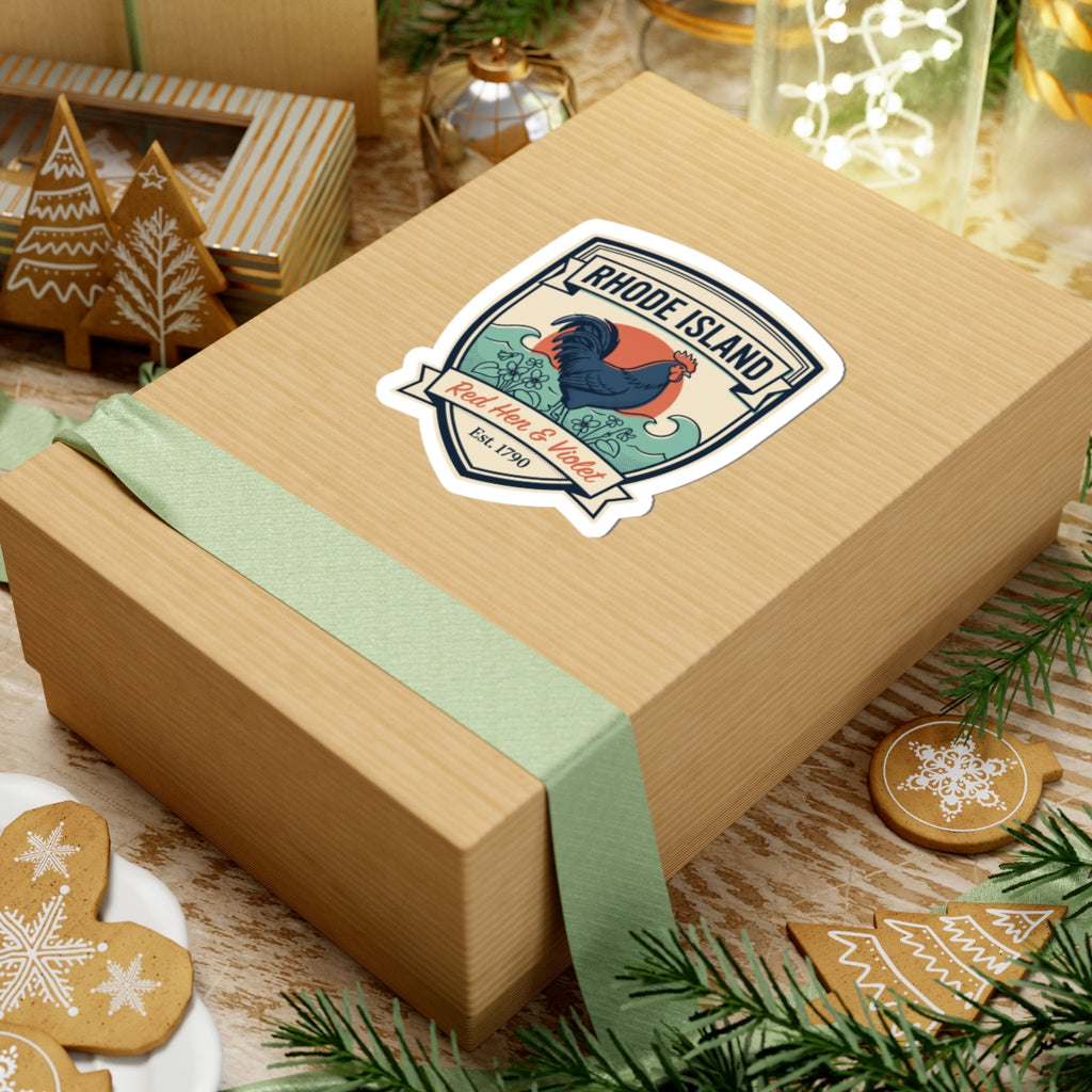 Rhode Island badge sticker on cardboard gift box with teal ribbon