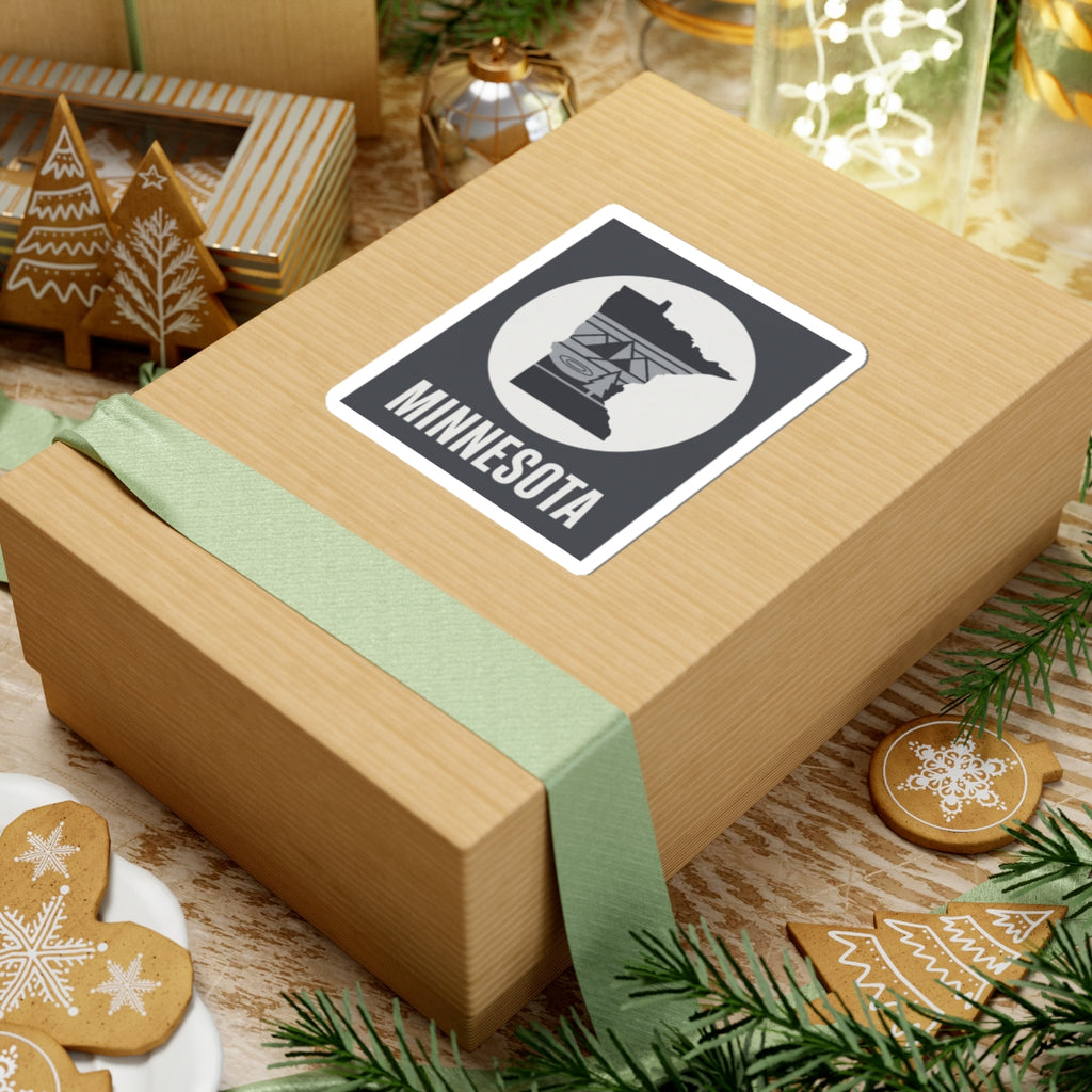 Minnesota state silhouette sticker on gift wrap with “MINNESOTA” wordmark
