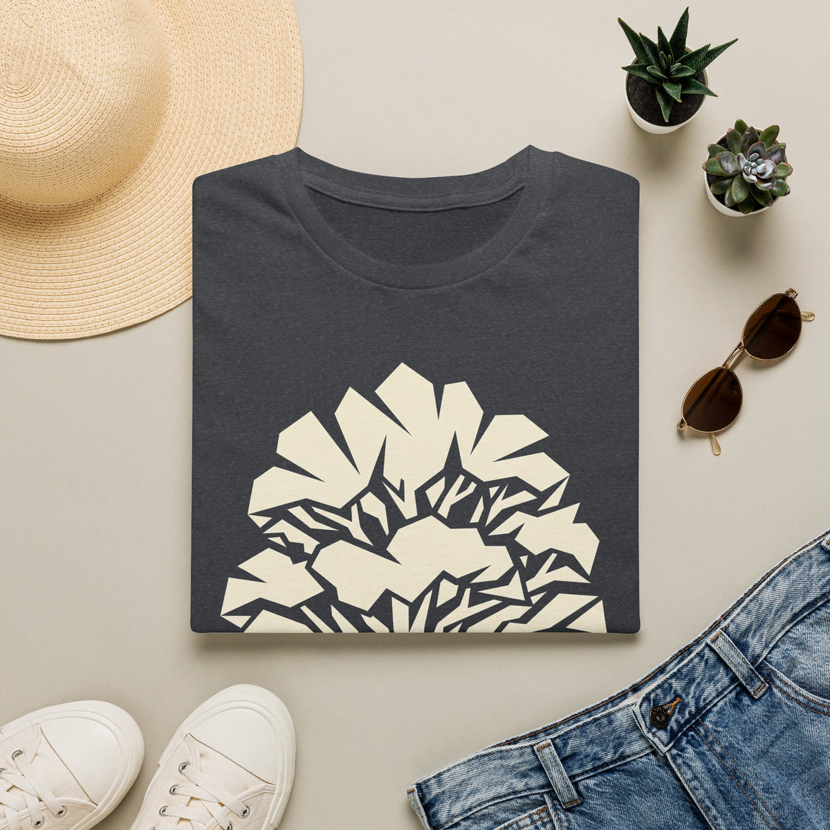 Charcoal gray t-shirt with geometric faceted tree silhouette graphic on front.
