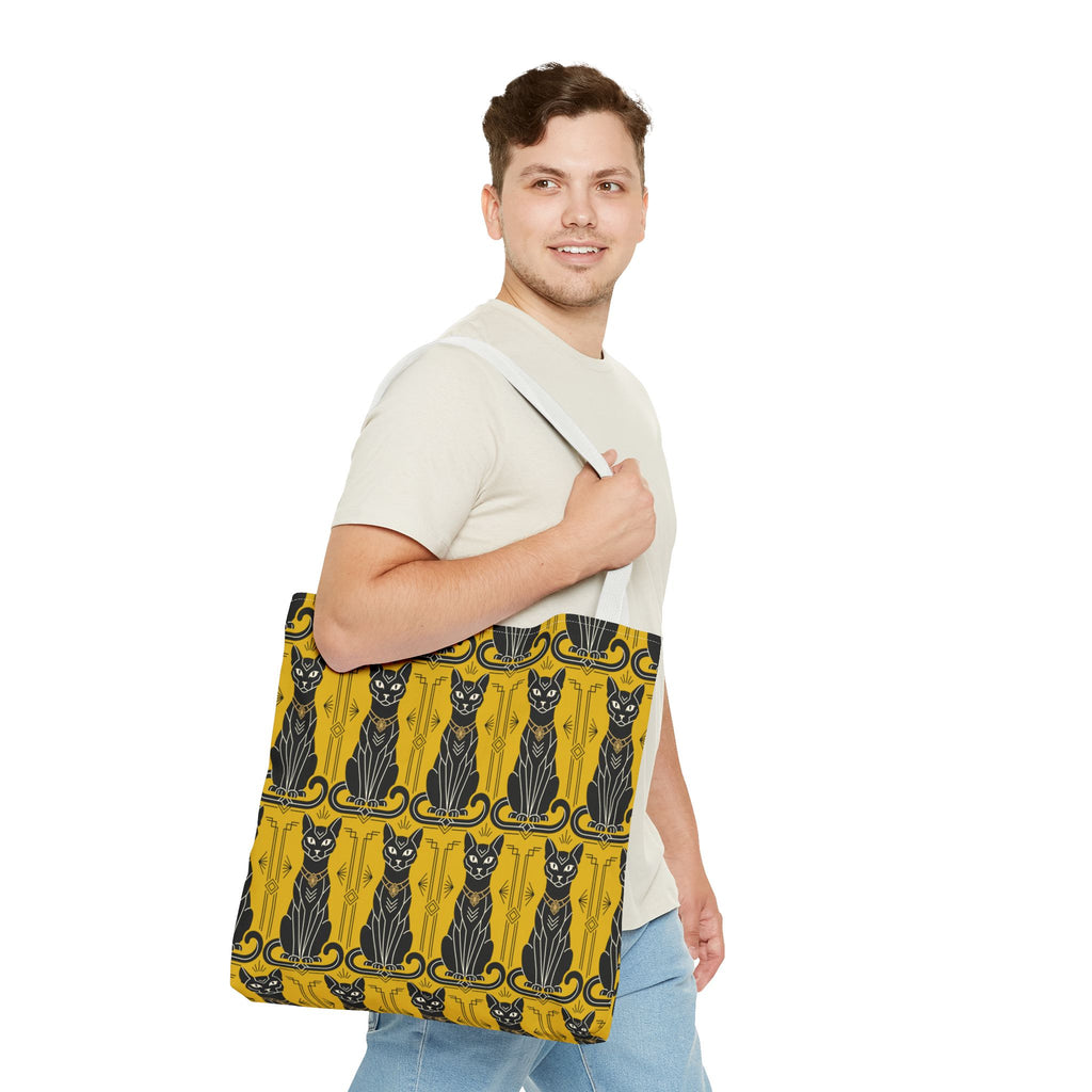 Yellow cat-pattern tote bag with navy handle straps and repeating cat illustrations