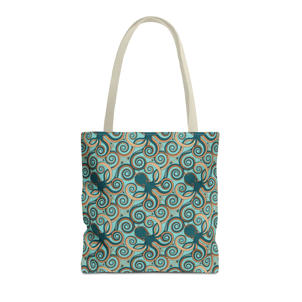 Octopus swirl tote bag with teal all-over pattern, beige handles