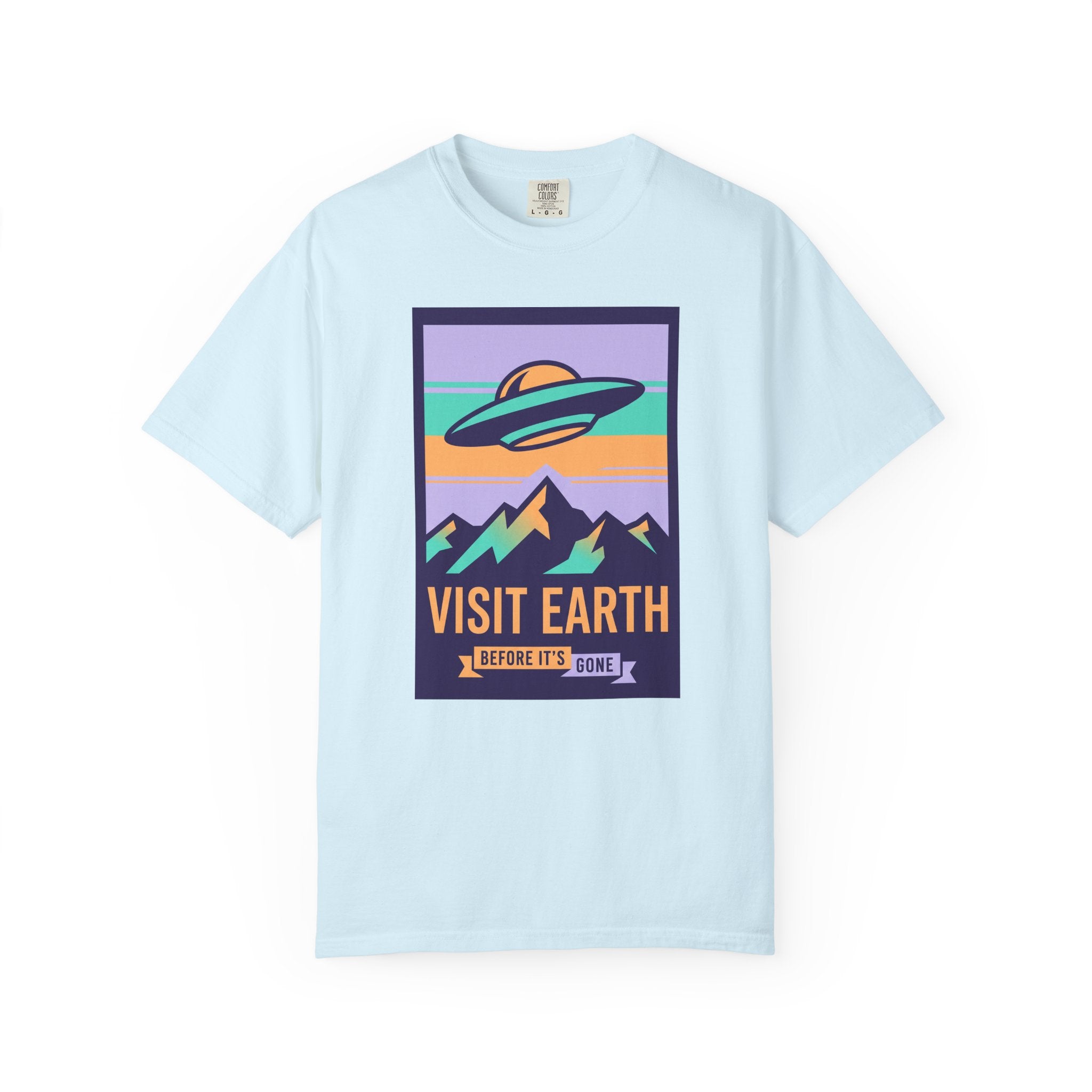 T-shirt with 'Visit Earth' UFO over mountains graphic, light blue