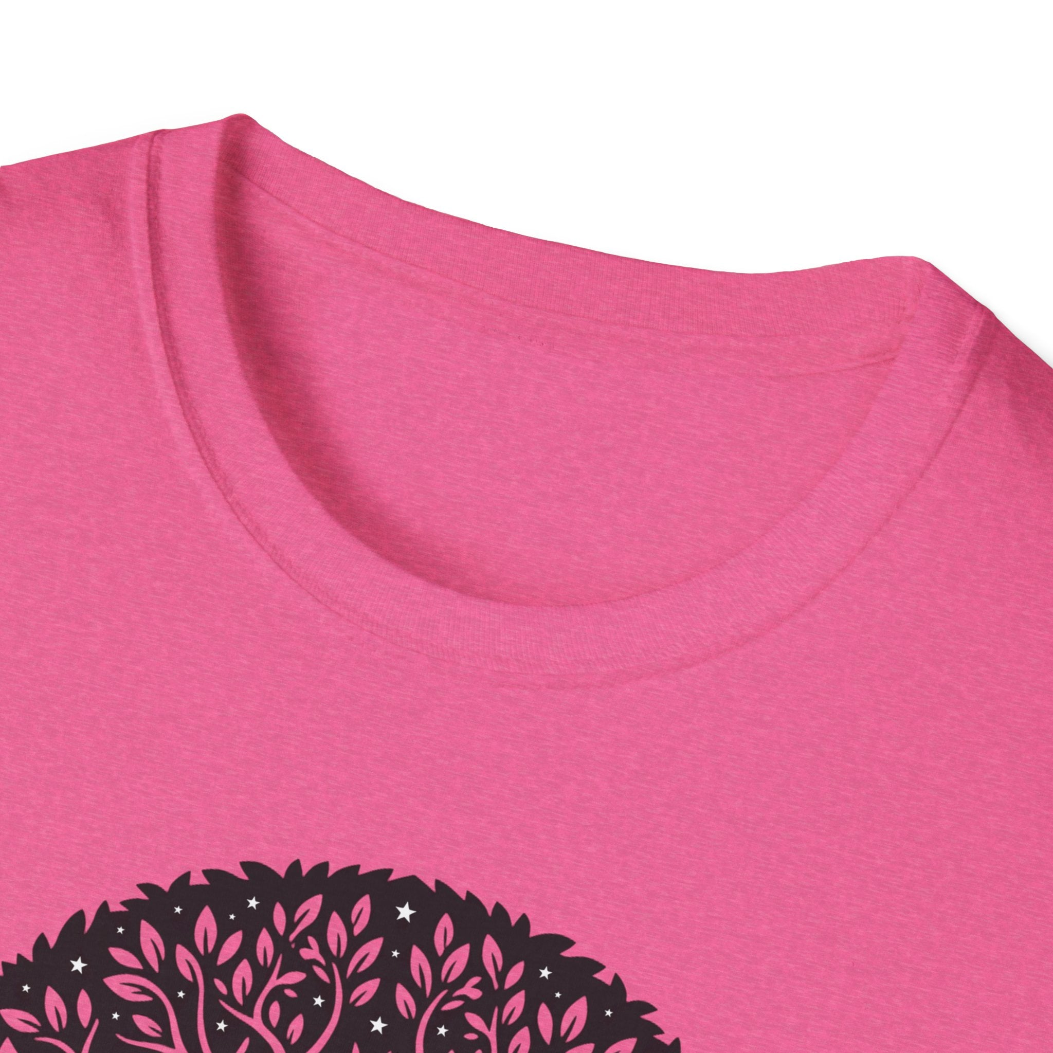Pink t-shirt neckline close-up with partial tree-of-life graphic