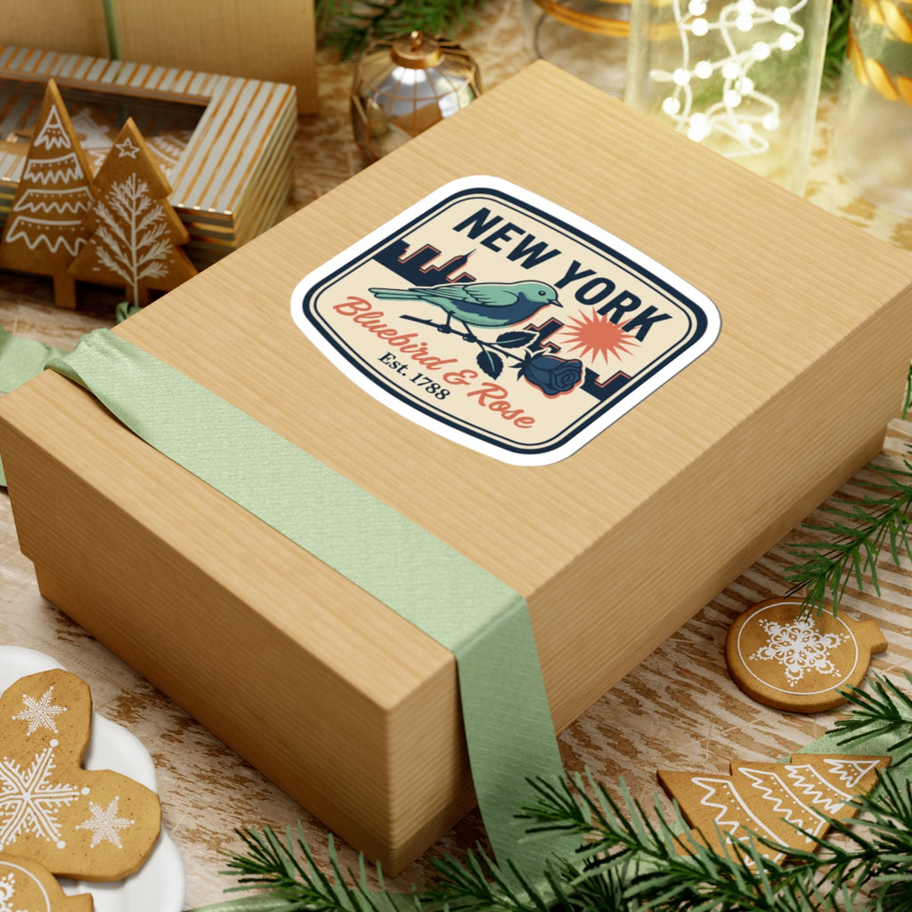 New York bluebird & rose sticker on a gift box with ribbon