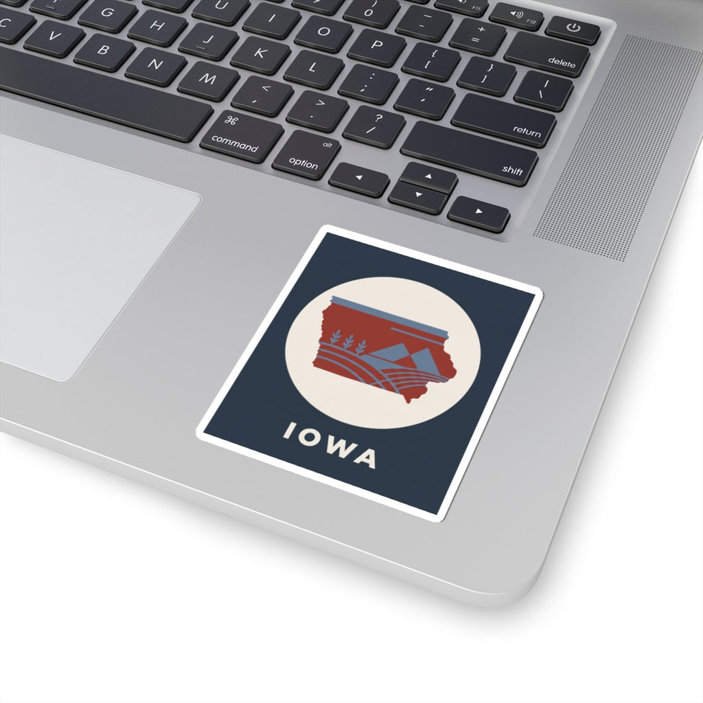 Square kiss-cut sticker with red Iowa state map graphic, blue circle background, "IOWA"