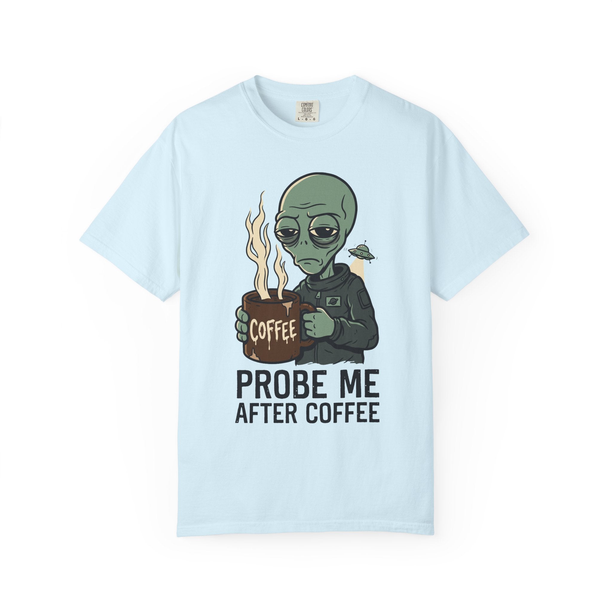 Light blue T-shirt with alien holding coffee cup graphic and 'PROBE ME AFTER COFFEE' text.
