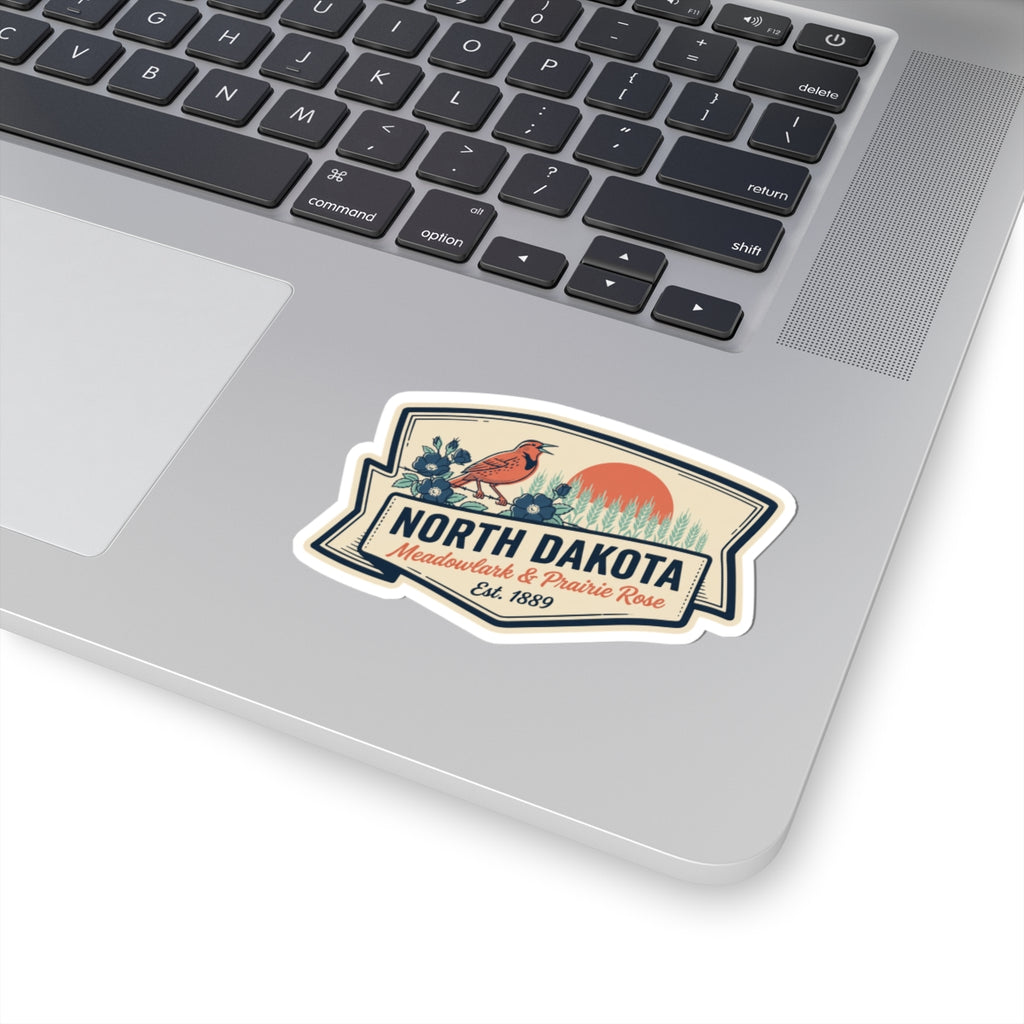 North Dakota kiss-cut vinyl sticker with bird and “Meadowlark & Prairie Rose” lettering on badge