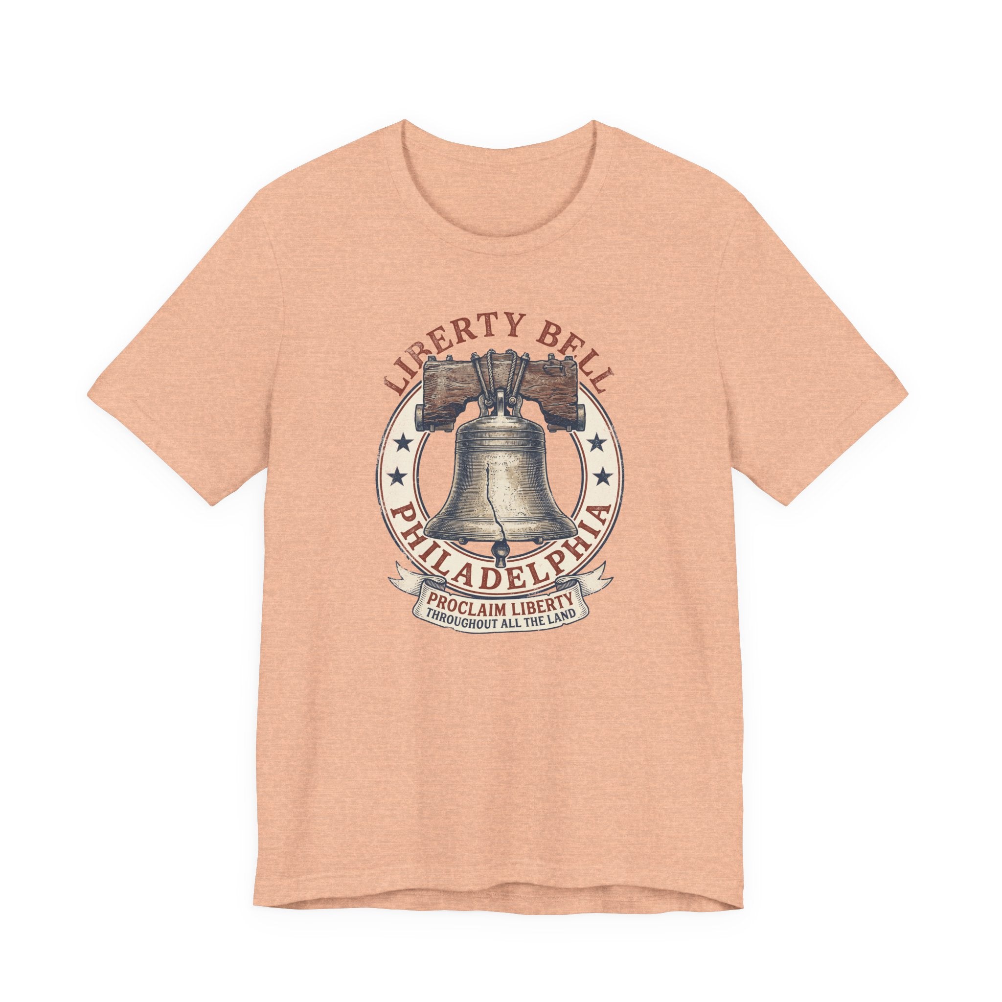 Peach T-shirt with Liberty Bell graphic emblem at center chest