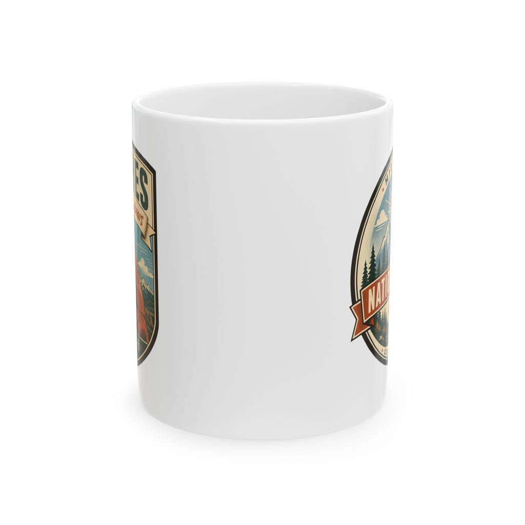 White ceramic mug with partial side print and circular emblem graphic