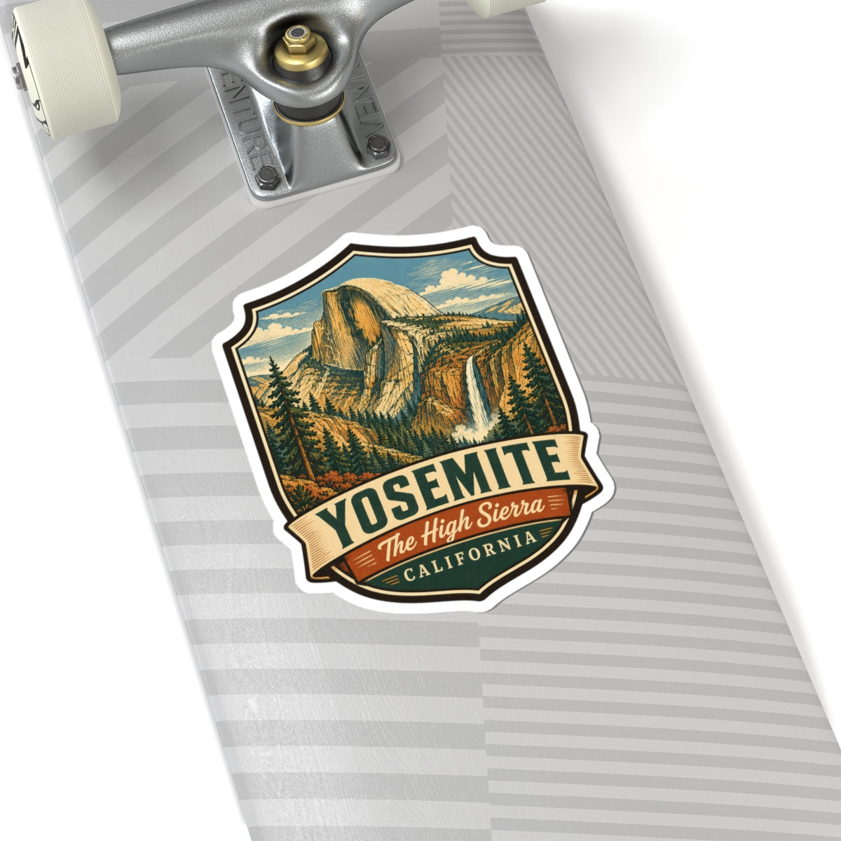 Yosemite sticker on skateboard deck, Half Dome shield with The High Sierra text