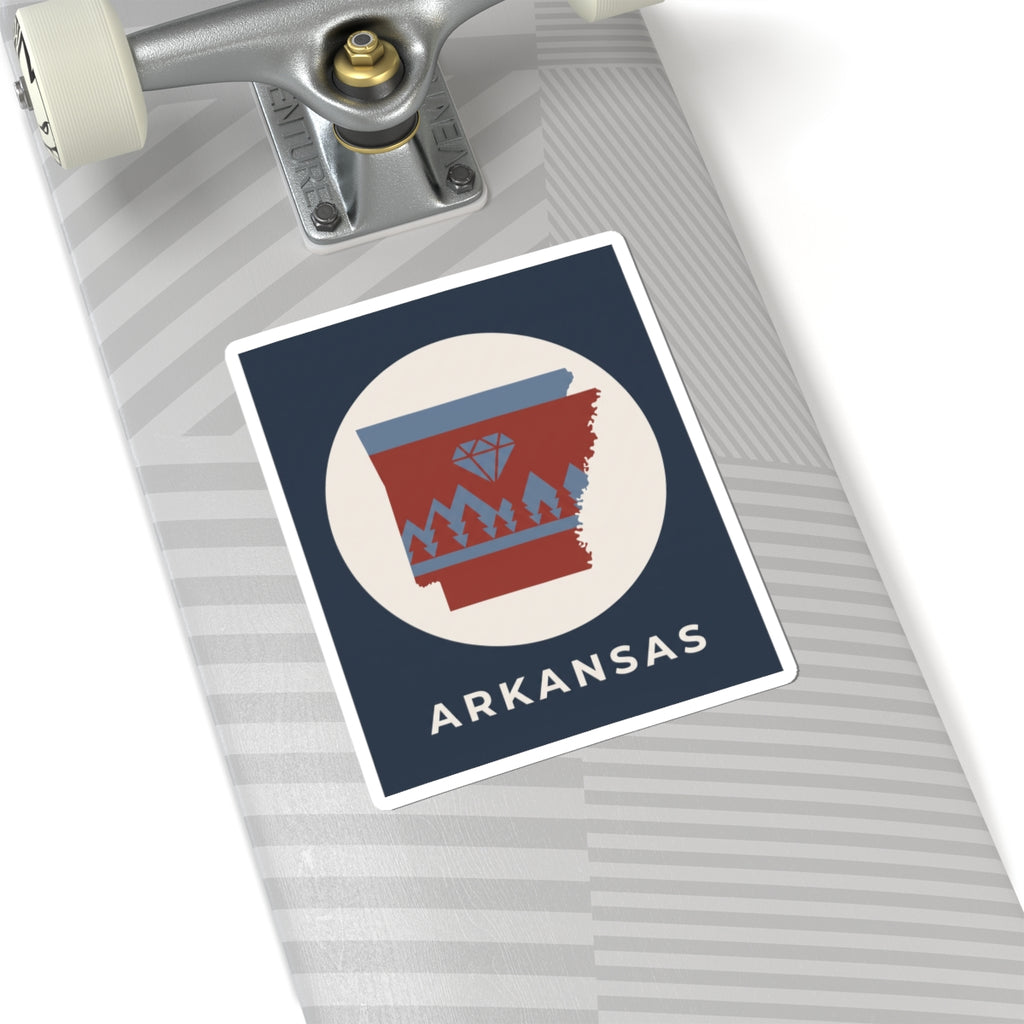 Arkansas emblem kiss-cut sticker on gray suitcase, diamond and pine trees with ARKANSAS