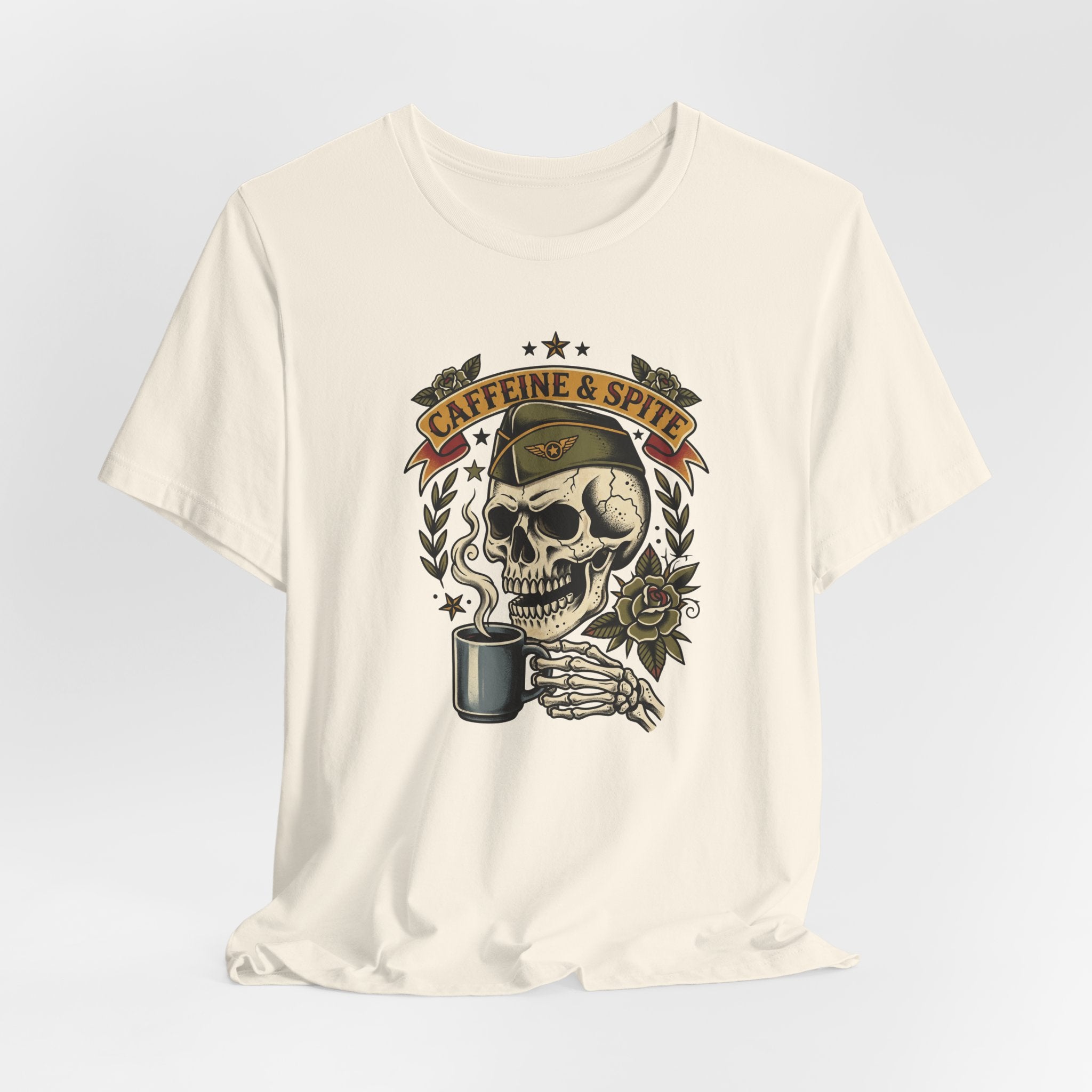 Cream T-shirt with skull, coffee cup, and “Caffeine & Spite” crest graphic