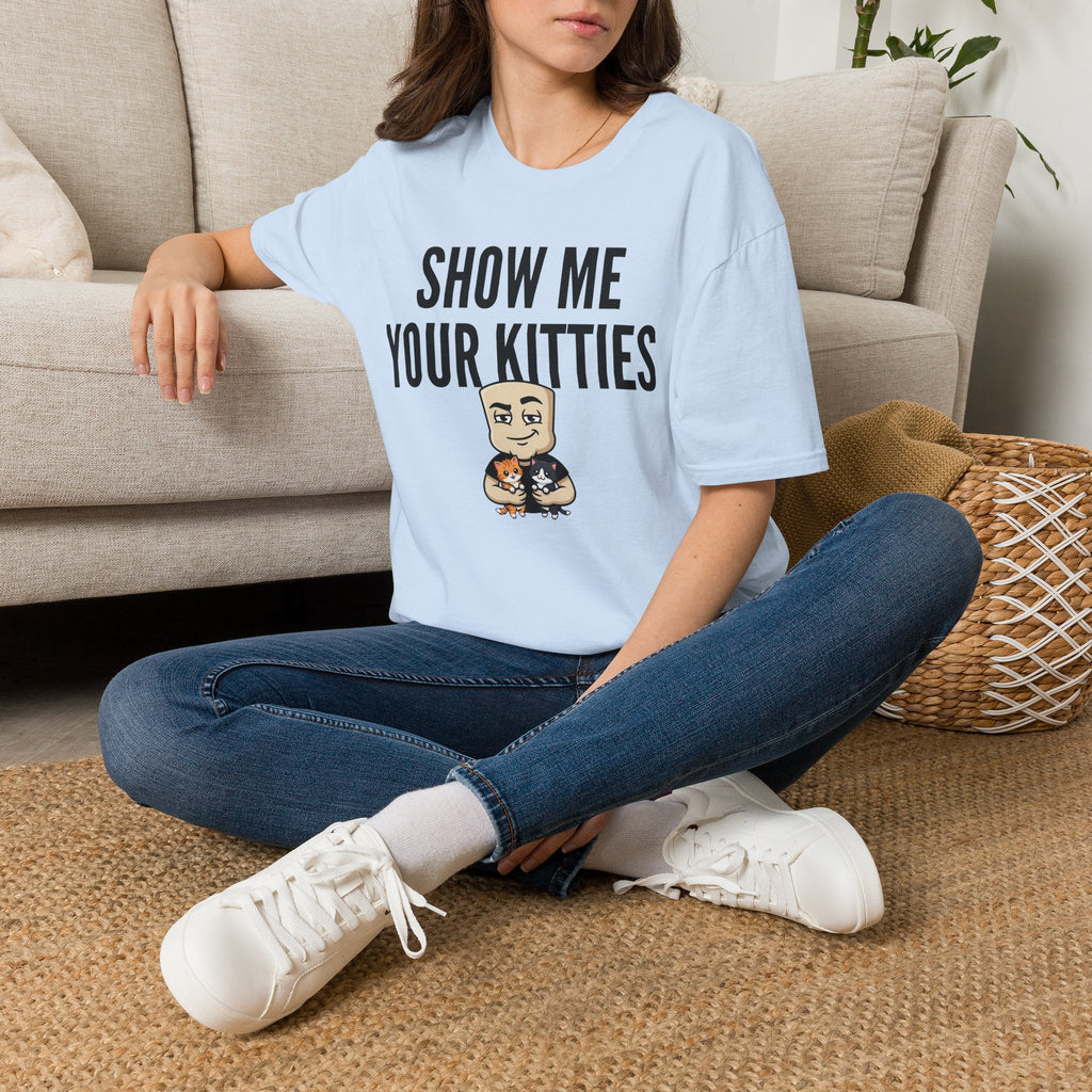 Light blue T-shirt with “SHOW ME YOUR KITTIES” cat graphic, worn by a model.