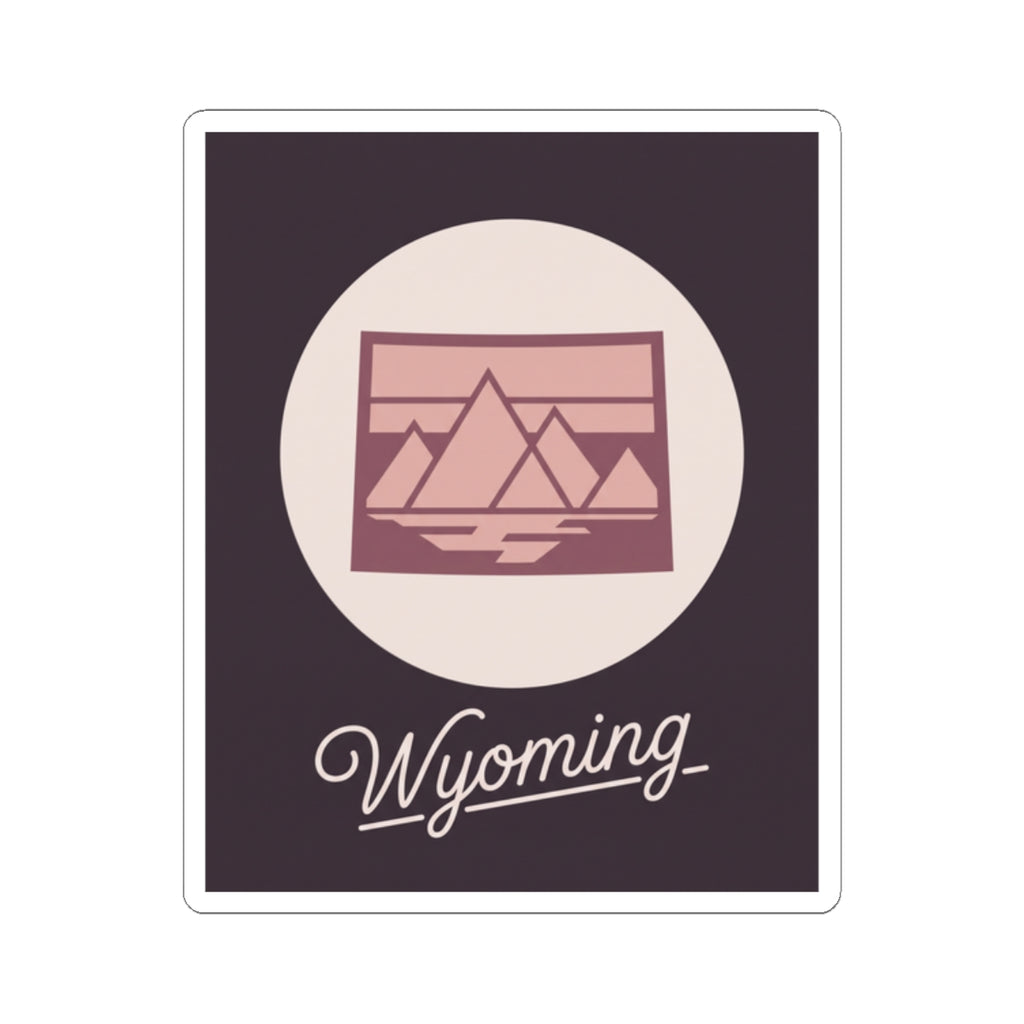 Wyoming kiss-cut sticker showing pink mountain illustration and cursive “Wyoming” word