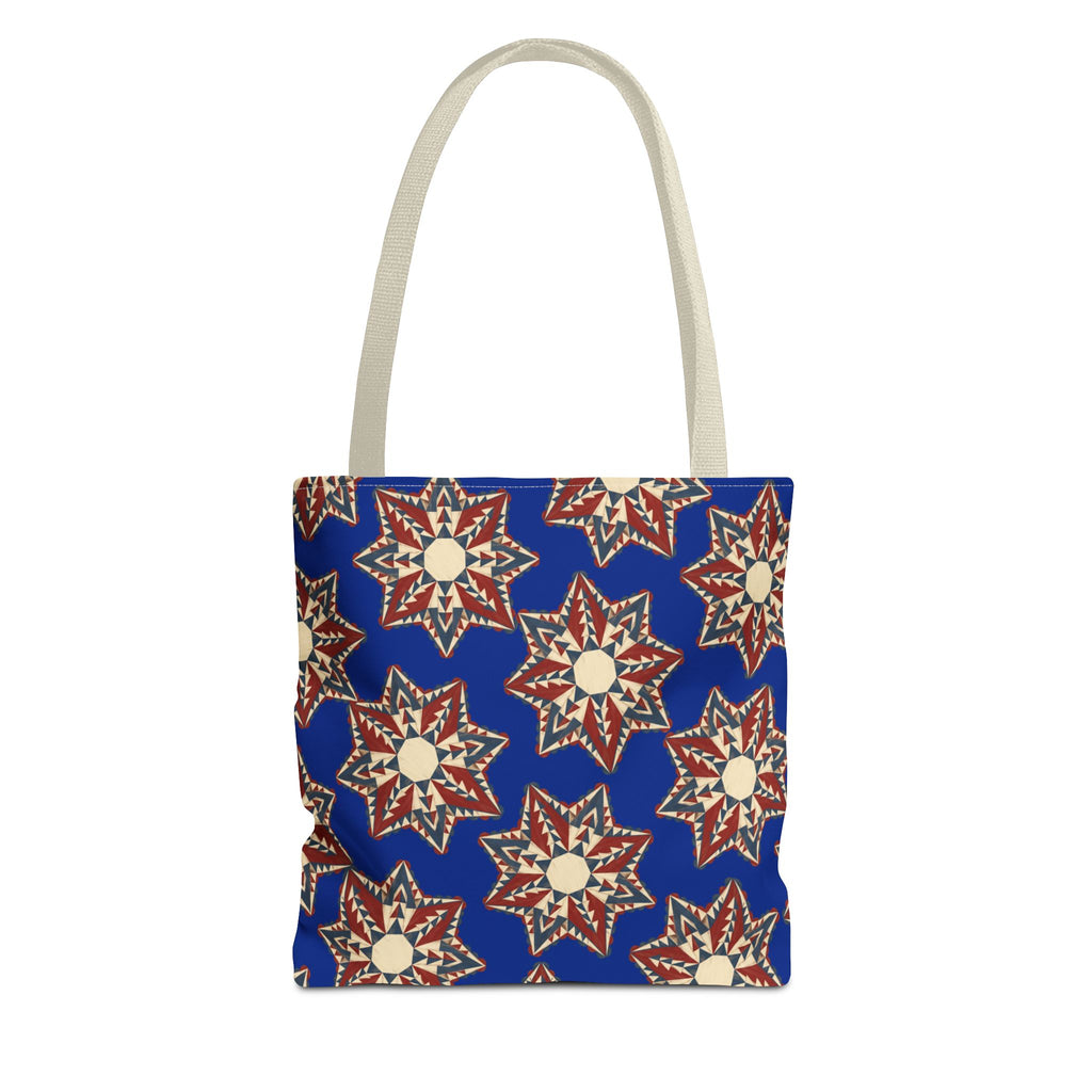 Blue tote bag with starburst floral pattern and beige-gray handles